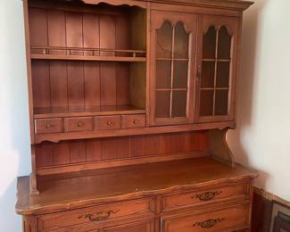 R110 - $60. China Cabinet. Drawers all slide. Moves in 2 pieces. Does have a broken glass panel on the top. Great project piece!