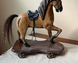 R68 - $100. Antique Hand Carved Wooden Horse Pull Toy with Metal Wheels and real horse hair tail.