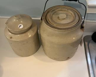 R56 - $20 Crock on Left. $50 - Lidded/Handled Crock on Right.