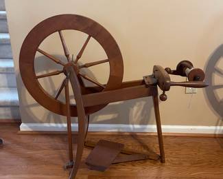 R127 - $100 Small Wooden Spinning Wheel. Includes what is in photograph.