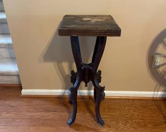 R126 - $30. Wooden Plant Stand. Top has some water damage.