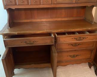 R110 - $60. China Cabinet. Drawers all slide. Moves in 2 pieces. Does have a broken glass panel on the top. Great project piece!