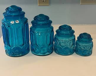 R20 - $45. Glass Canister Set. Some chipping - see photos. Still great colorful decor pieces!