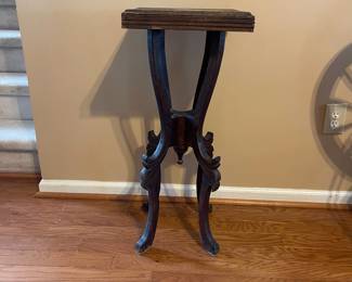 R126 - $30. Wooden Plant Stand. Top has some water damage.