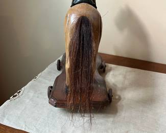 R68 - $100. Antique Hand Carved Wooden Horse Pull Toy with Metal Wheels and real horse hair tail.