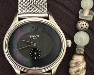 Many fashion wrist watches including this Tissot!