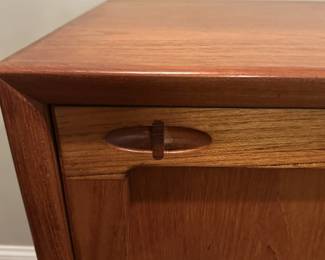 1970's Modernist Teak Sideboard on Base with Sliding Doors. Measures 31"H x 75"L x 18"D. Image 3. Price $850