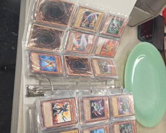 massive binder of YU-GI-Oh cards 