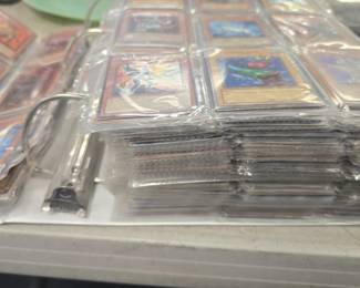 massive binder of YU-GI-Oh cards 