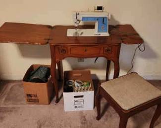 Singer Sewing Machine And Suppies
