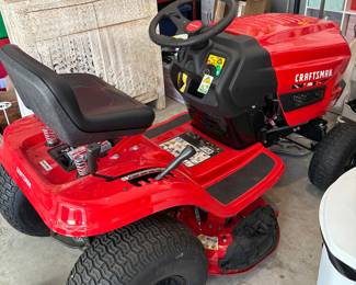 Craftsman T100. Only rode twice for small area of grass