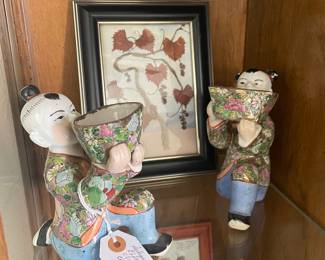 Antique Chinese Boy & Girl with botanical framed picture in background. 