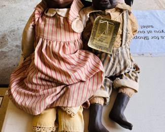 made in 1988 by artist Donna Raye and are part of a limited series from the Heritage Collection. Still wearing their original tags and clothing