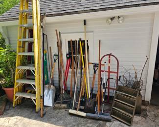 Large ladders and yard tools