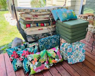 New and like new outdoor seat cushions and pillows  
