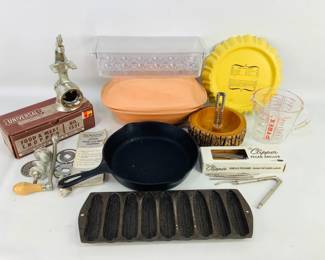 Unique Kitchen Items Including a Roemertopf Terra Cotta Roaster and Cast Iron Pan