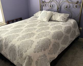 Queen bed with metal headboard
