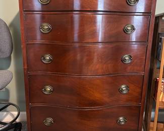 Serpentine chest of drawers