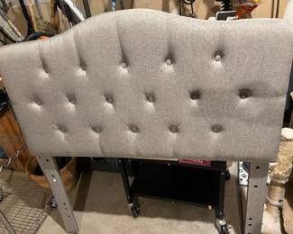 Twin headboard. That’s z a shadow on the right, not a stain 