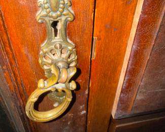 Edwardian Solid Mahogany Wardrobe, Circa 1800's. There are 2 of these unique pieces. This piece is raised on a deep Plinth base and separates for ease of transporting, 2 hanging areas behind the mirrored doors with an upper shelf, 4 drawers and above that a shelved opening. Perfect for those older homes with small closets.
