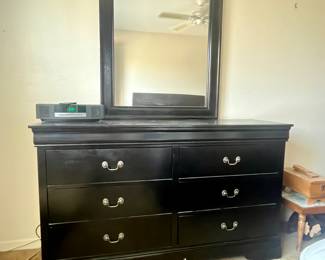 Black six drawer dresser with mirror