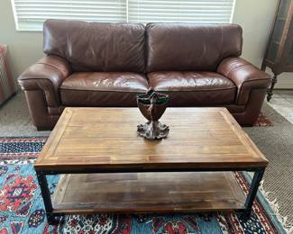 Brown leather couch and coffee table