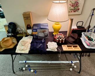 35mm Camera • Vintage Cowgirl Hat • Toaster • Poker Chips • Desk Clock • Desk Lamp • Curtsin Rods