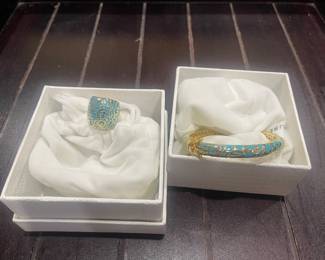 Lauren G Adams enameled bracelets and rings.