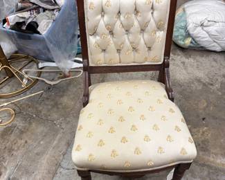 Eastlake chair recovered in bee fabric