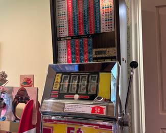 5 cent slot machine on original stand showroom