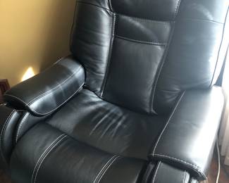 Black leather recliner that fully reclines back $750