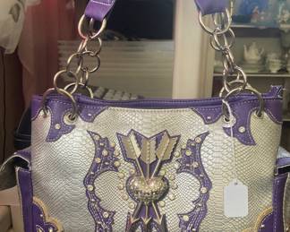 “Cowgirl Trendy” - Even has a place for a gun…
