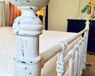 $600; white distressed queen-size iron bed frame, very solid; includes Tempur-Pedic memory foam mattress and boxspring; close up of footboard, metal details