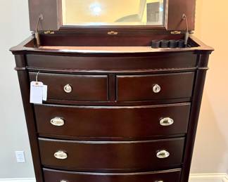 $500 each (2 available); 6-drawer high boy dresser with silver accents and flip top mirrored valet, top two drawers are lined; 40x19x57. Excellent condition! 