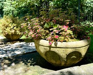 $100 each (2 available); large, low, circular concrete planter with geometric design; 24"dx11"h. No known cracks. 