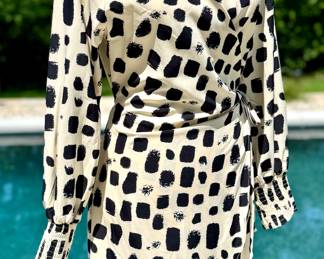 $40; Aakaa cream and black print wrap dress with elastic sleeve accents; size S
