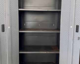 $360; Gladiator brand metal cabinet with locking doors, adjustable shelves, and leveling feet; 36x18x72