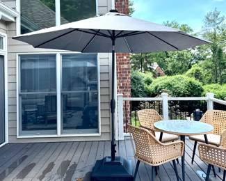 SOLD; Sunvilla umbrella with outdoor linen-type fabric and tilt feature, including water-filled base; 9'd