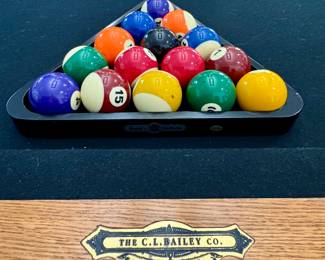$800; CL Bailey & Co pool table with black felt, black leather pockets, black wood claw feet, including pool cues & stand, 2 sets of balls and accessories all in great shape; plus heavy duty ping pong table topper with accessories; Great Deal!!! 55"x100"x31"