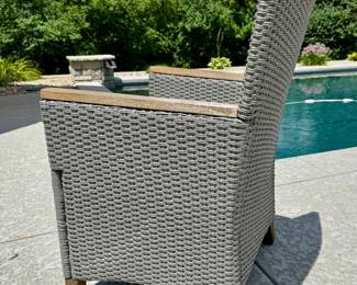 $600; outdoor wood table with 8 resin wicker and wood chairs plus seat cushions; table: 89x40x30; chairs: 25x21x26; view of resin wicker chairs