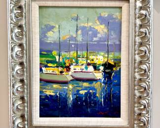 $150; framed harbor scene in silver frame (as is, frame shows a few cracks); Artwork in perfect condition. 19x25