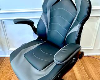 $280; office chair on wheels with flip up arms; currently retails for $469; 29x27x49. Great condition. 