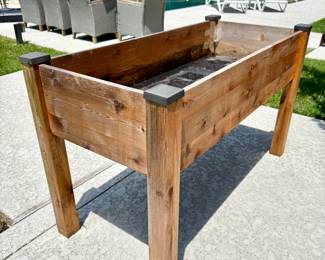 $150 each (3 available); THESE ARE GREAT! raised, wood garden bed with drainage system inside; these currently retail for $270; 49x23x30