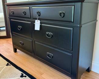 $250; 6 drawer black dresser with metal loop pulls (as is--shows wear on the top); 55x18x36