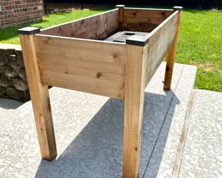 $150 each (3 available); THESE ARE GREAT! raised, wood garden bed with drainage system inside; these currently retail for $270; 49x23x30