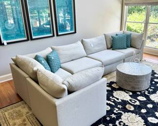 ($1800; Bassett L-shaped sectional sofa with loose-back and seat cushions; 154" x 80" as shown (but may be rearranged); 38"d and 39"h) ($400; black and cream rug with botanical design; professional cleaning recommended, but in good condition; approximately 12'x15') ($240; modern coffee table with shell accents; 30"dx17"h) ($24 each--4 available; turquoise geometric design pillow)