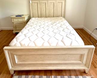 $600; queen-size farmhouse panel bed in weathered white, mattress and boxspring included/optional; sells new on Amazon for $919.