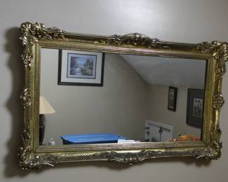 Long gold framed mirror