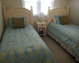 Coastal chic twin bedroom suite: twin beds; nightstand; long dresser with mirror