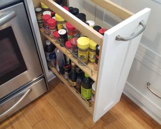 Cabinetry detail: pull out spice storage